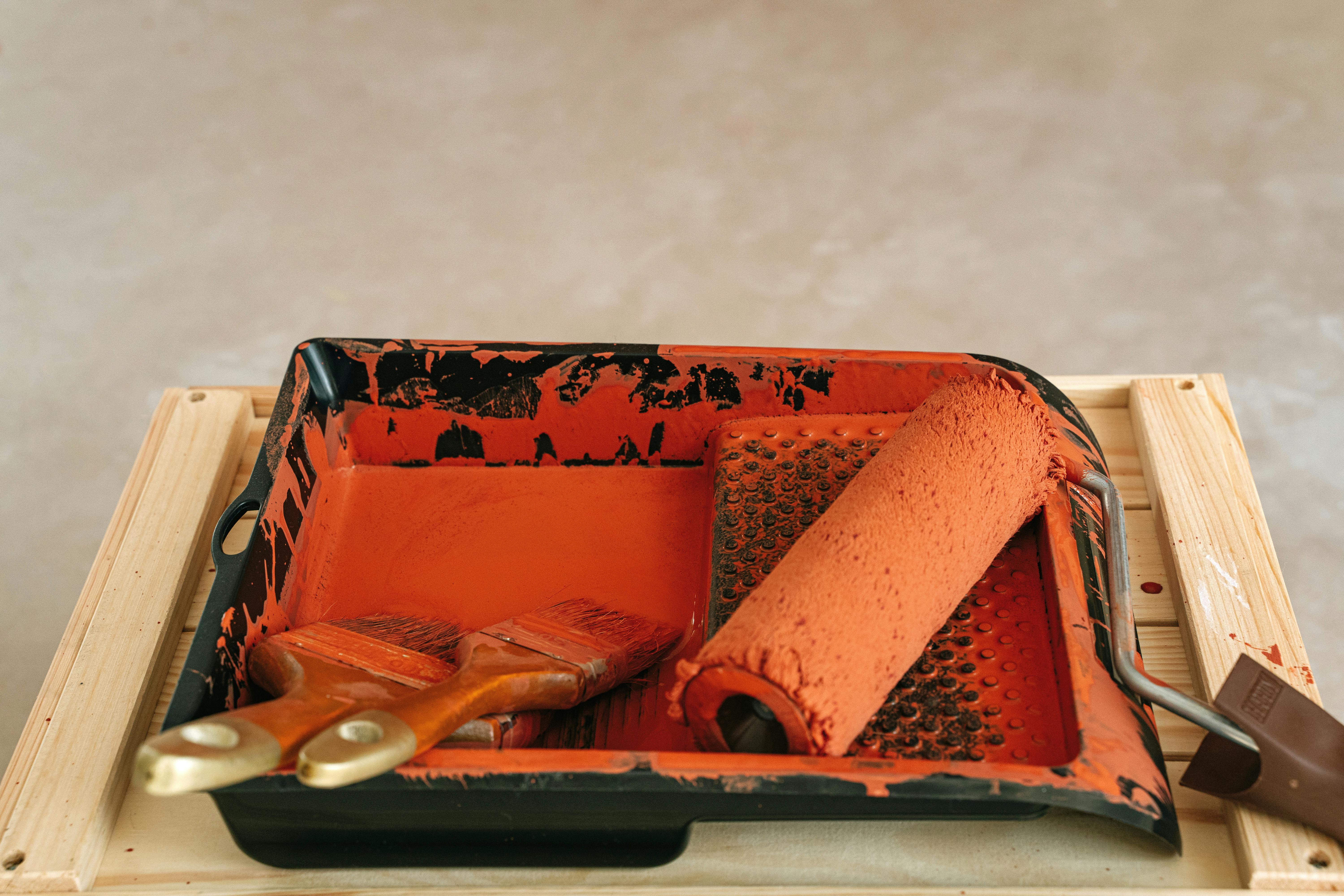 a paint tray with orange paint